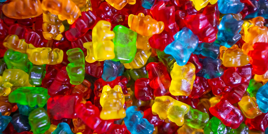 Assorted colorful gummy bears close up view