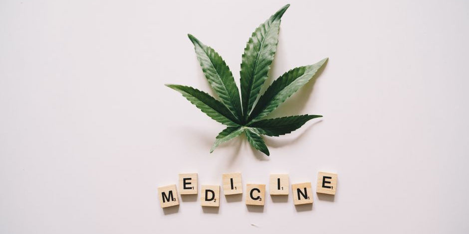 Cannabis leaf with medicine text on tiles