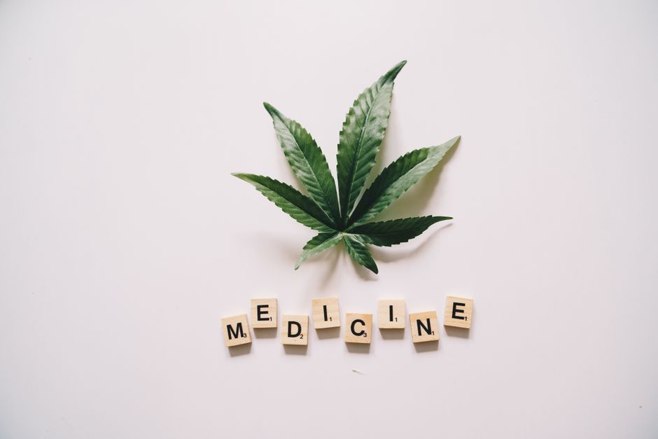 Cannabis leaf with medicine text on tiles