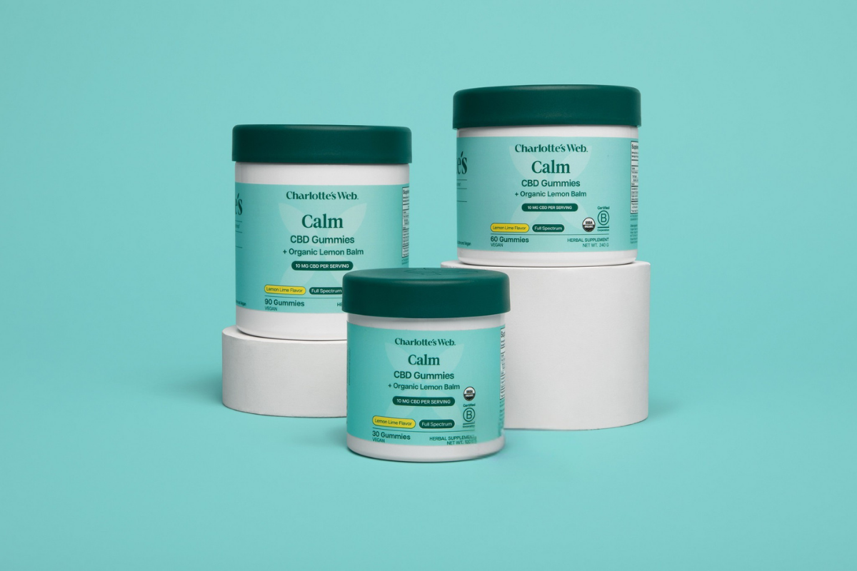 Three jars of Charlotte's Web Calm CBD Gummies on a teal background