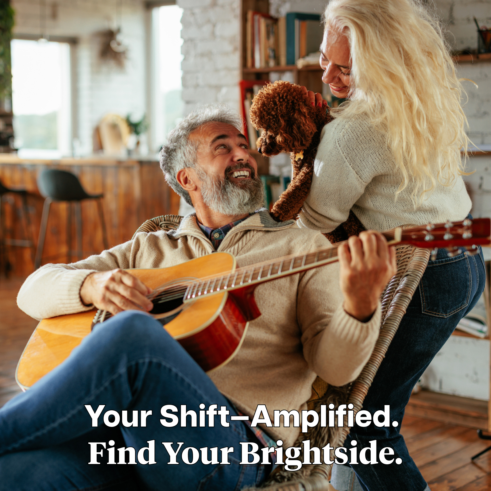 Product Image for Man playing guitar with woman holding a dog in a cozy living room with text 'Your Shift — Amplified. Find Your Brightside.'