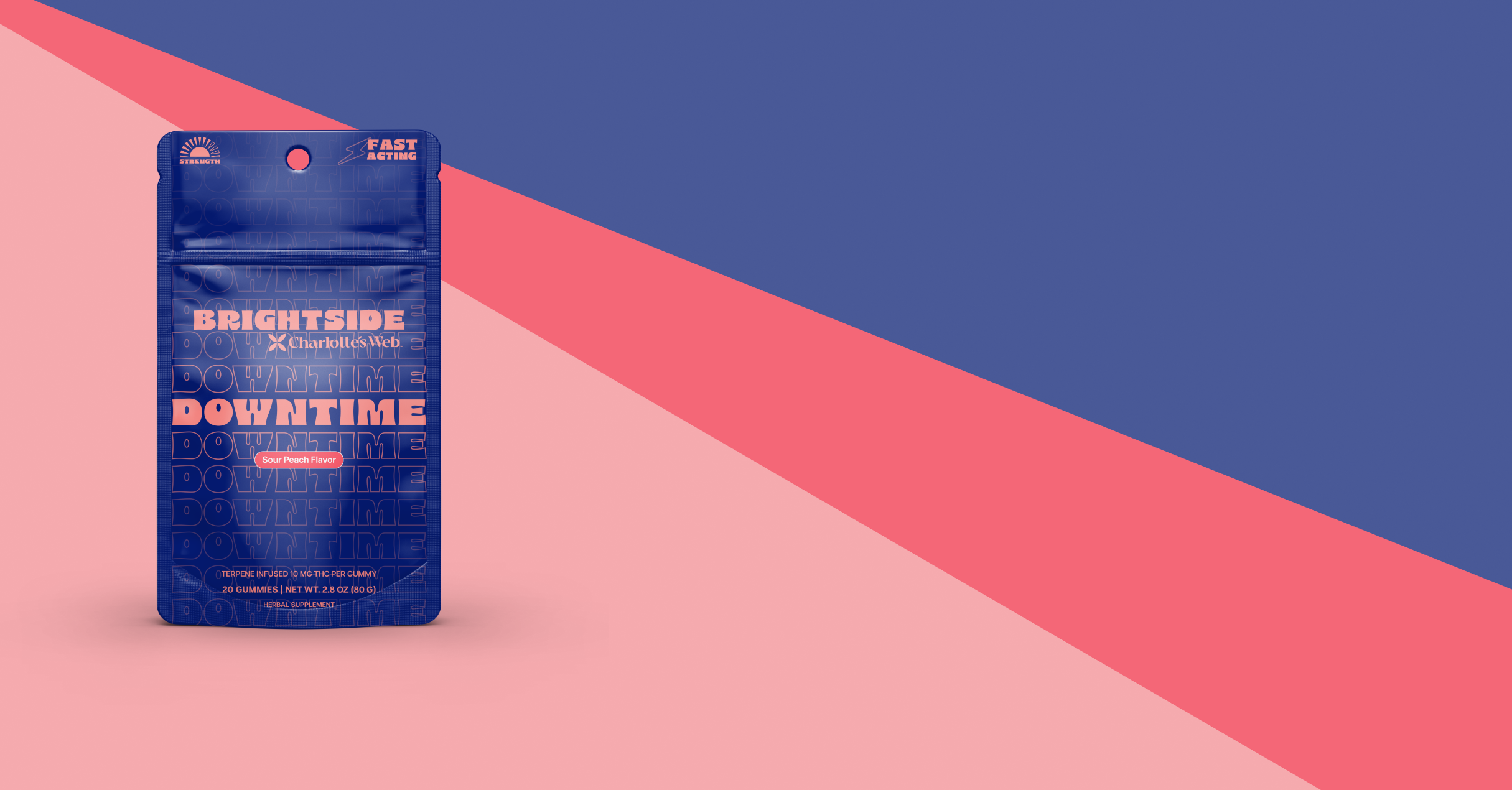 Blue Charlotte's Web Brightside Downtime gummies package on a blue and pink diagonal striped background