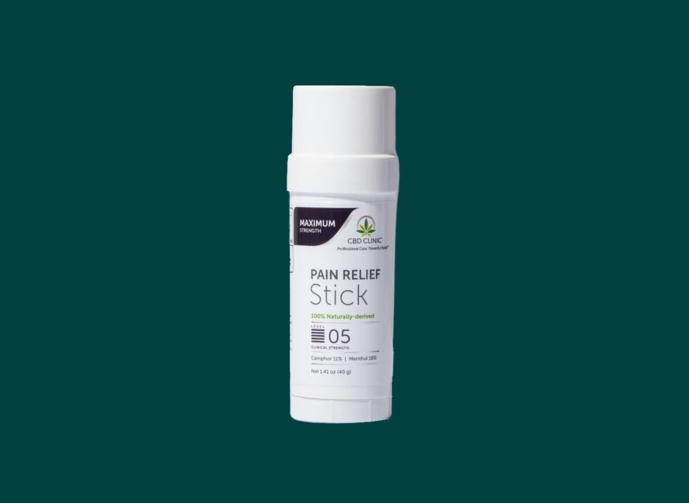 Pain relief stick with Maximum CBD Clinic branding on a green background