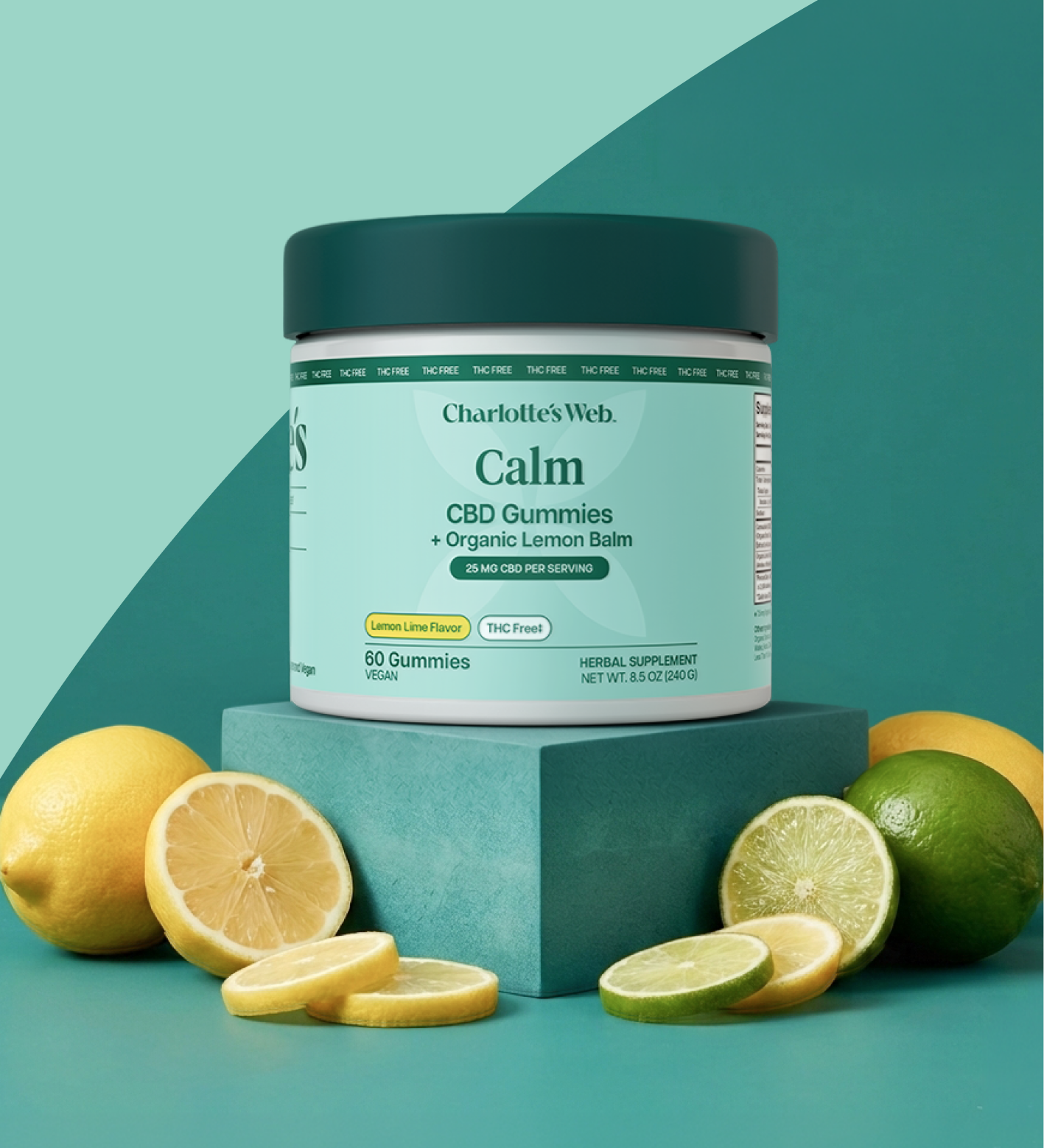 Charlotte's Web Calm gummies with 25mg of broad-spectrum CBD on a teal background with lemon and limes